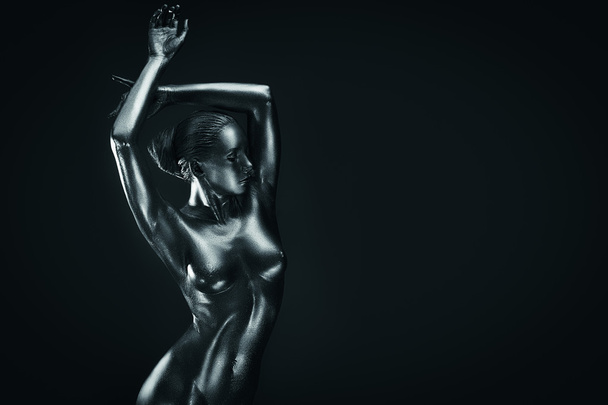 Lady in silver paint front pose - Foto, Bild