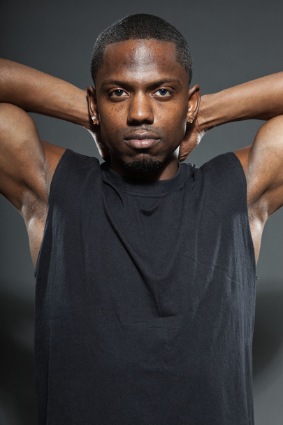 Black american basketball player. Studio portrait isolated on grey background. - Фото, изображение