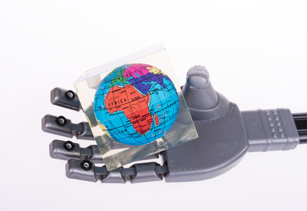 robotic mechanical arm with globe - Photo, Image