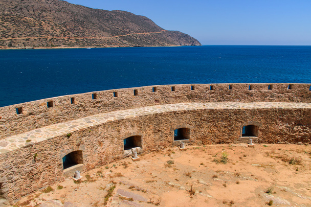 Spinalonga Island in Greece. Ancient ruins and sea view - Photo, Image