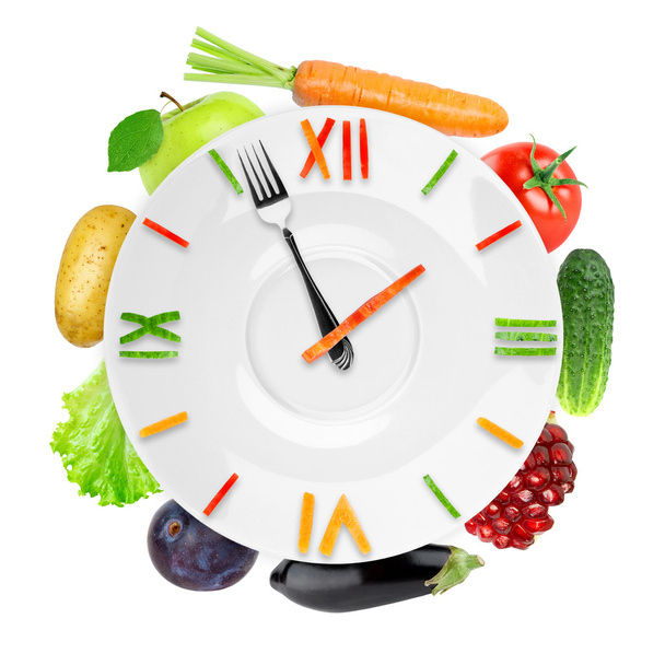 Food clock with fruits and vegetables  - Fotó, kép
