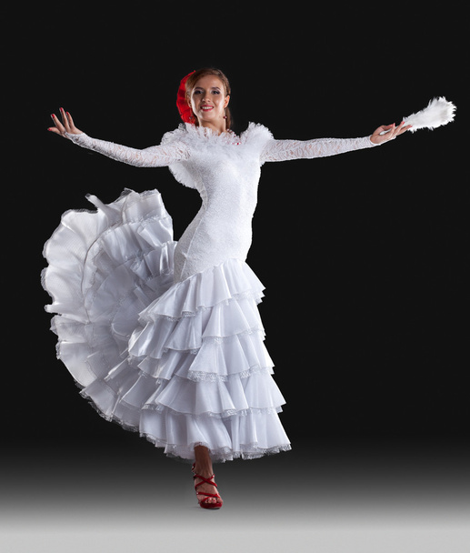 Young woman show white flamenco costume - Foto, afbeelding