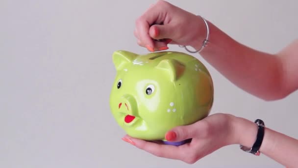 Girls hand with money box. - Footage, Video