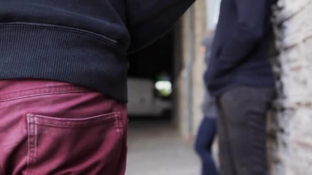 Addict buying dose from drug dealer on street - Filmmaterial, Video