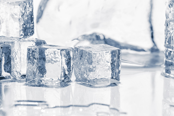 Ice cubes on the table - Фото, зображення