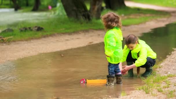 Adorable Kids Playing In Huge Puddle After Rain - Footage, Video