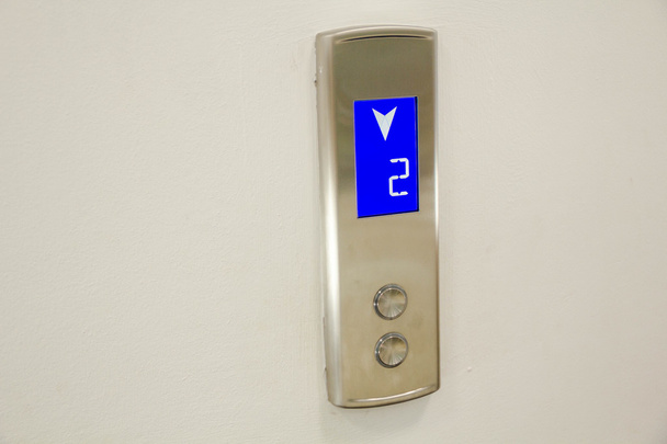 Close-up Elevator Pressing. Modern Metal . button. businessman is a lift. - Photo, Image