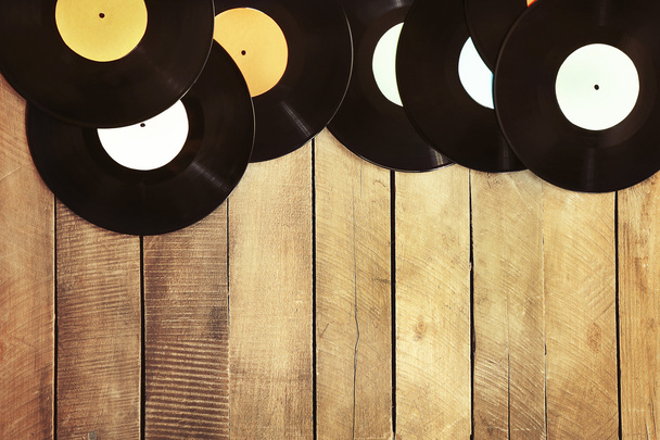 Vinyl records on table - Фото, изображение