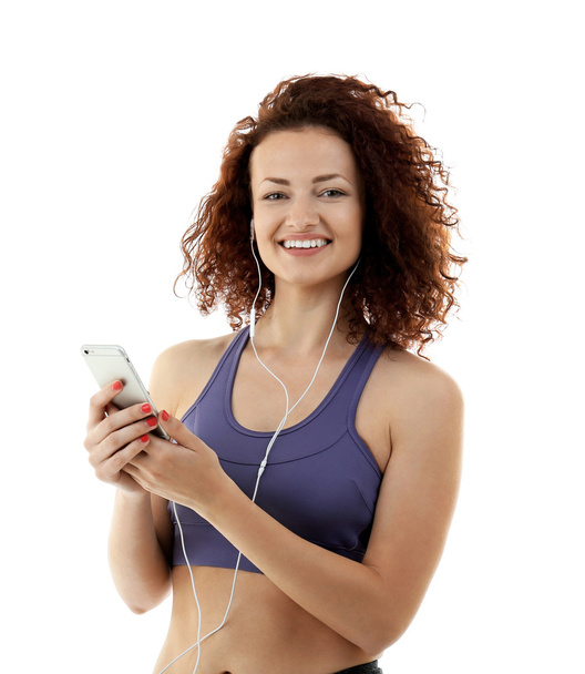 Attractive woman listening to music - Фото, зображення