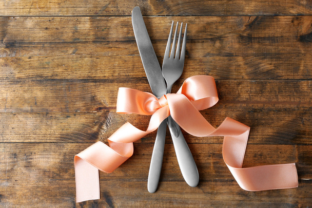 Fork and knife with ribbon - Photo, Image