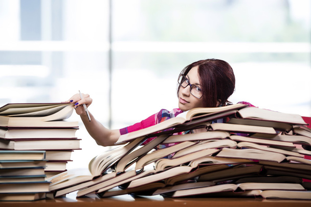 Young woman student preparing for college exams - Foto, imagen