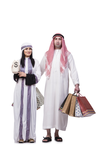 Happy arabic family after shopping isolated on white - Photo, Image