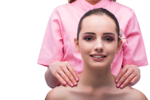 Hermosa mujer joven durante la sesión de masaje facial
 - Foto, Imagen