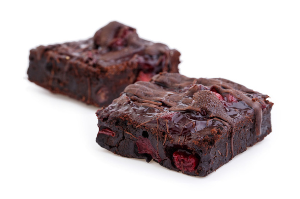Delicious vegetarian brownie with cherries isolated on white bac - Photo, Image