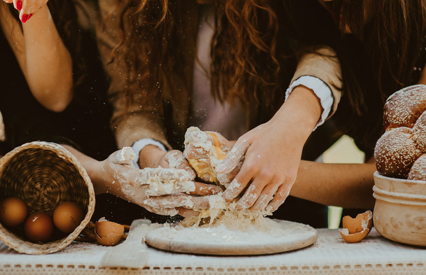 female Hands kneading dough  - Zdjęcie, obraz