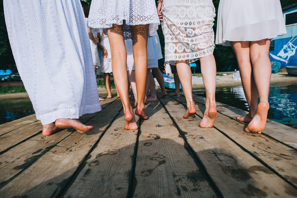 a group of girls on the dock - Valokuva, kuva