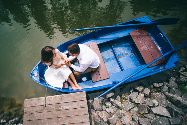Wedding couple on a boat  - Фото, зображення