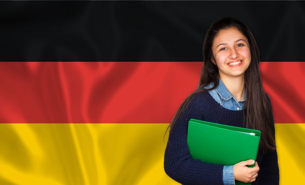 Student Nastolatki uśmiechający się nad niemiecką banderą - Zdjęcie, obraz
