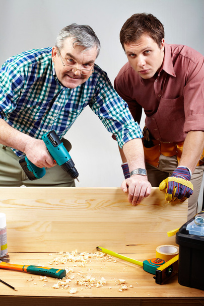 Dois carpinteiros
 - Foto, Imagem