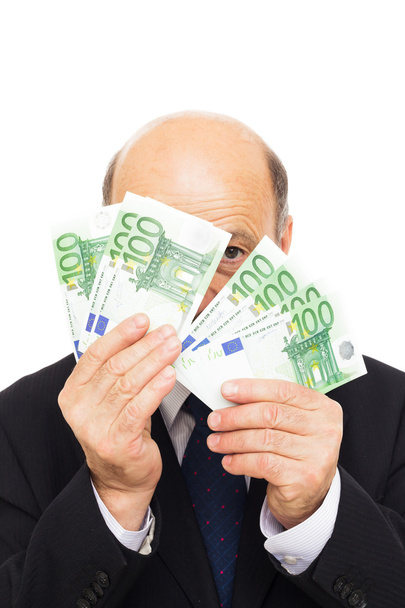 uomo anziano si nasconde accanto al denaro
 - Foto, immagini