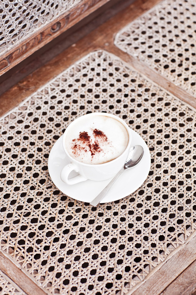 cup of cappuccino, cup of coffee, cup of coffee on white wicker  - Foto, Bild