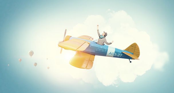 Meisje vliegende oude vliegtuig. Mixed media - Foto, afbeelding