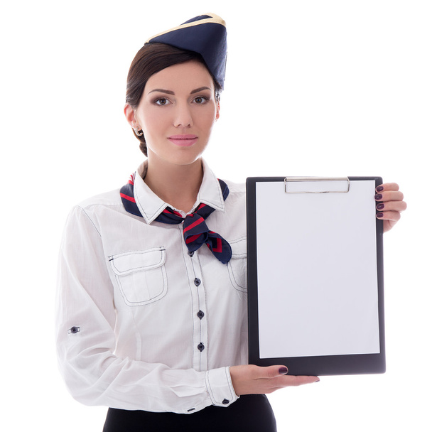 portrait of young stewardess with blank clipboard isolated on wh - Foto, imagen