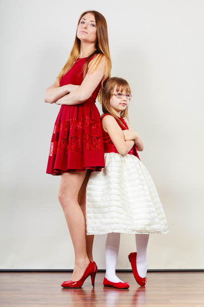 Mother and daughter posing together - Фото, изображение