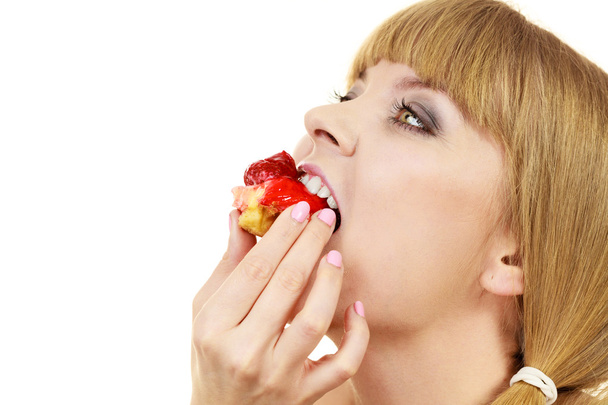 Woman eating cupcake sweet food  - 写真・画像