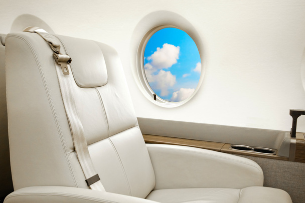 Business jet flight, aiircraft porthole view - Photo, Image