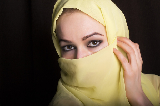 close-up beautiful mysterious eyes eastern woman wearing a hijab - Photo, Image