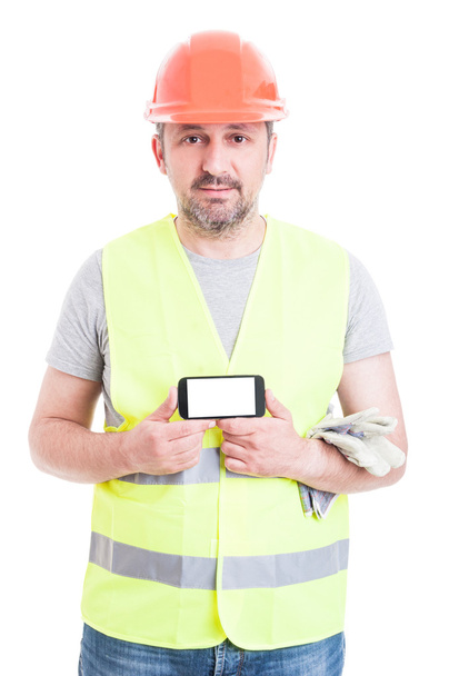 Atrakcyjny mężczyzna Konstruktor wyświetlone telefon rezygnować pusty ekran - Zdjęcie, obraz