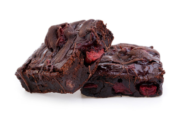 Delicious vegetarian brownie with cherries isolated on white bac - Photo, Image