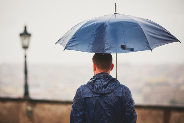 Man in rainy day - Fotó, kép