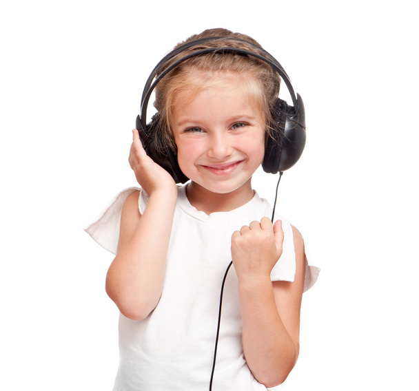 Little girl with headphones - Fotó, kép