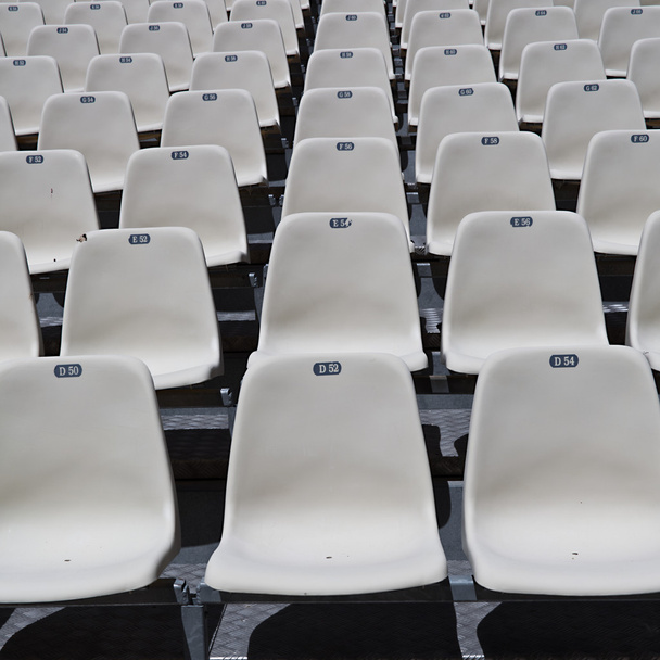 White numbered seats - Photo, Image
