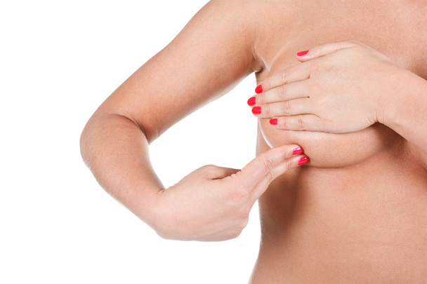 女性彼女の乳房をチェック - 写真・画像