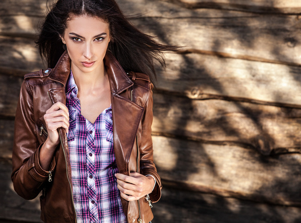 Young sensual & beauty brunette woman pose on grunge wooden background - Fotografie, Obrázek