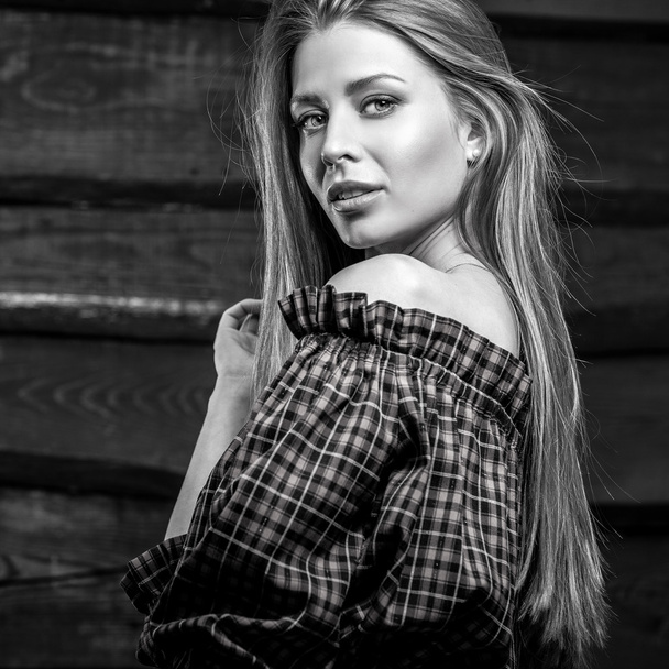 Young sensual & beauty blonde woman pose on wooden background - Фото, зображення