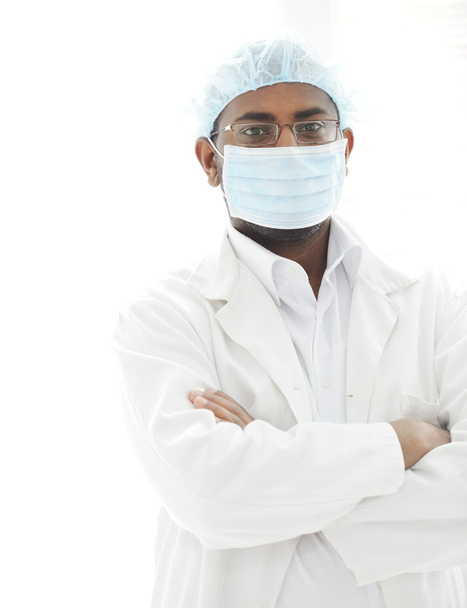 Confident African American male surgeon smiling - Valokuva, kuva