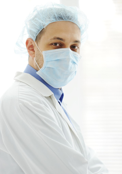 Doctor with a mask at hospital - Фото, зображення