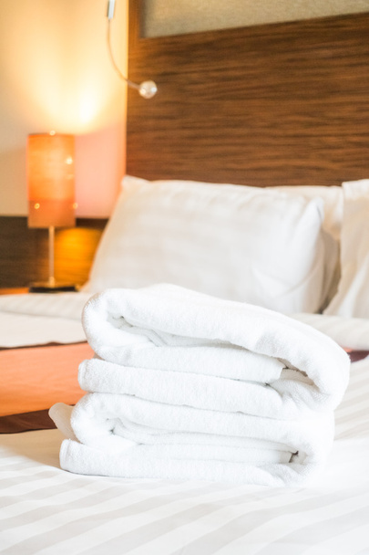 Bath towel on bed - Photo, Image
