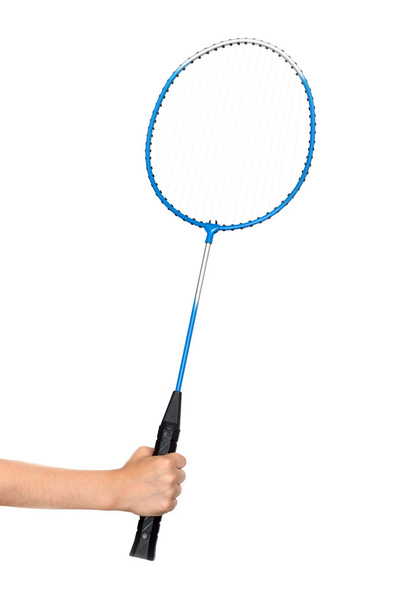 child's hand holding a badminton racket on a white - Φωτογραφία, εικόνα