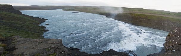 Iceland: panoramic view of the Gullfoss waterfall after the midnight sunset - Photo, Image