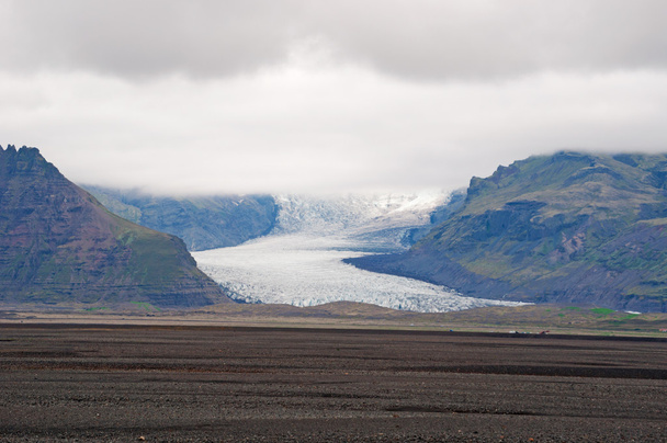 Izland, Európa: légifelvétel a Skaftafellsjokull, a Skaftafell gleccser, a gleccser nyelvét spurting le Vatnajokull, a legnagyobb jégsapka Izland belül természetvédelmi terület Oraefi, a Vatnajokull Nemzeti Park  - Fotó, kép