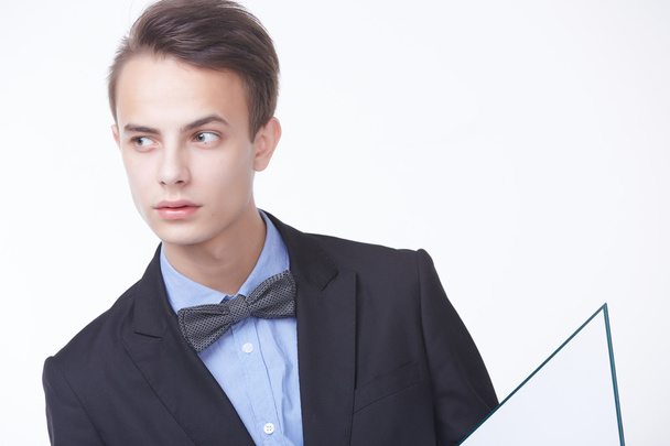 Young confident businessman with folder  - Foto, afbeelding