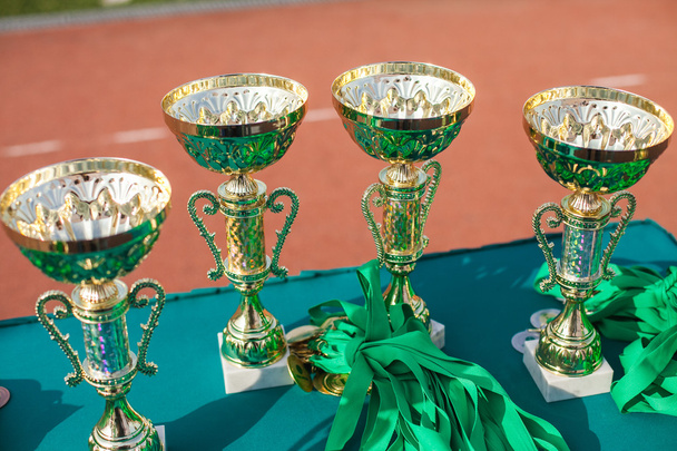 Victorious cups in sports meets. Cups of winners. Trophy cups. - Photo, Image