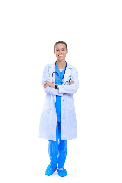 Woman doctor with stethoscope standing with arms crossed isolated on a white background - Fotoğraf, Görsel