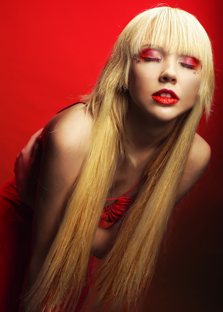 Perfect blond model in red dress - Foto, Imagen