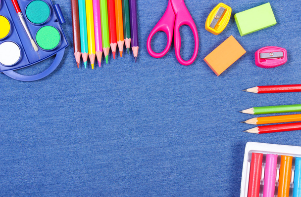 School and office supplies on jeans background, back to school concept, copy space for text - Foto, Imagen